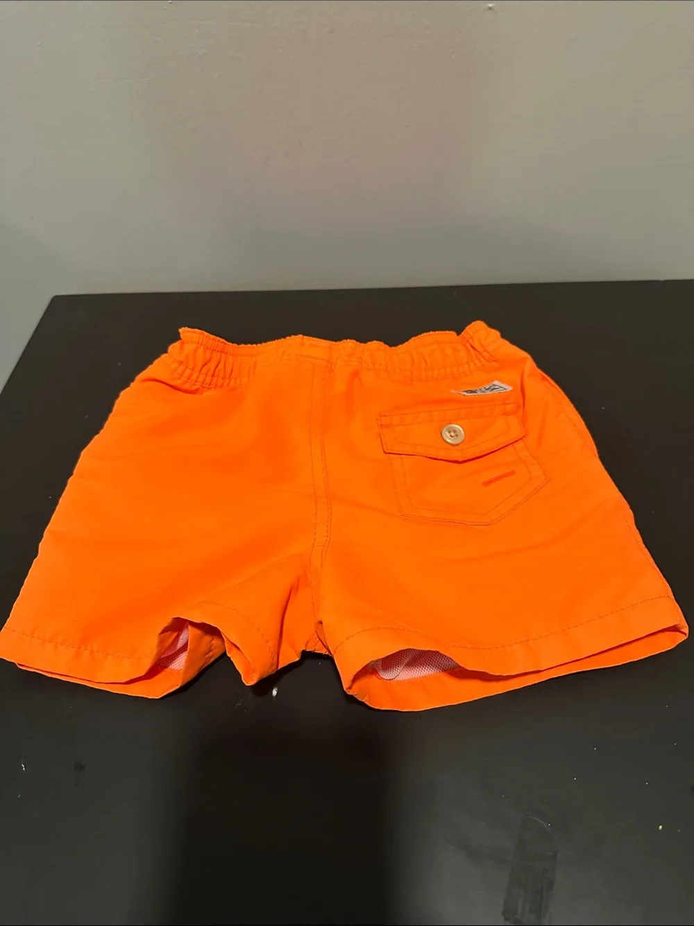 Ralph Lauren Orange Kids Swim Trunks with Teddy logo. Size 9-12 months